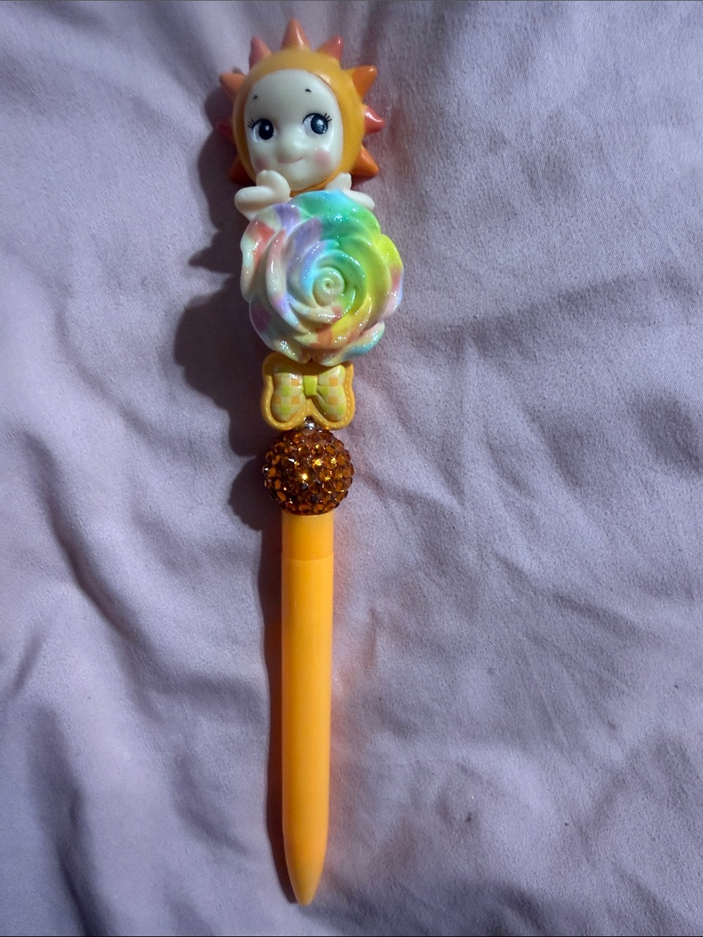 Orange Sonny Angel with flower.  Extra pen refill included